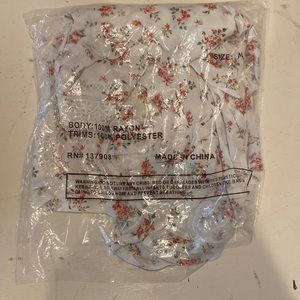 White blouse with pink flowers from Just Polly. Medium. Unworn. Tags still on.